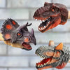 Trois marionnettes à main dinosaures tricératops, tyrannosaure et carnotaure sur fond de briques - EducaKid